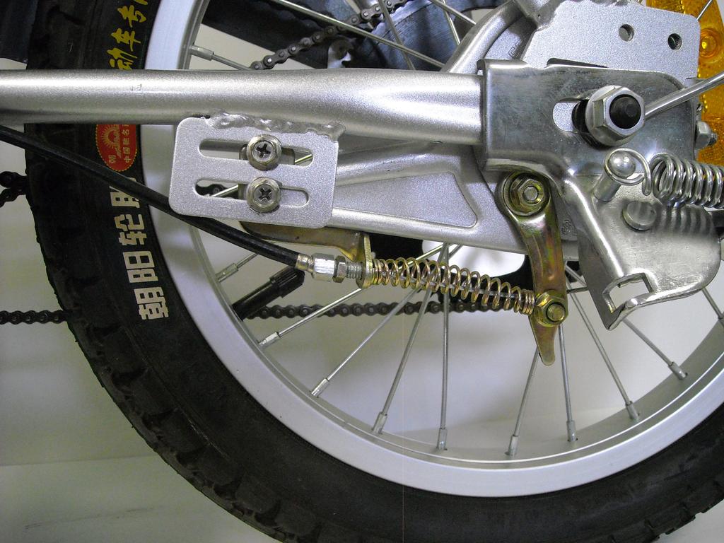 Adjusting Front and Rear Brakes Although we adjust your brakes at the factory, your brakes should be checked before
