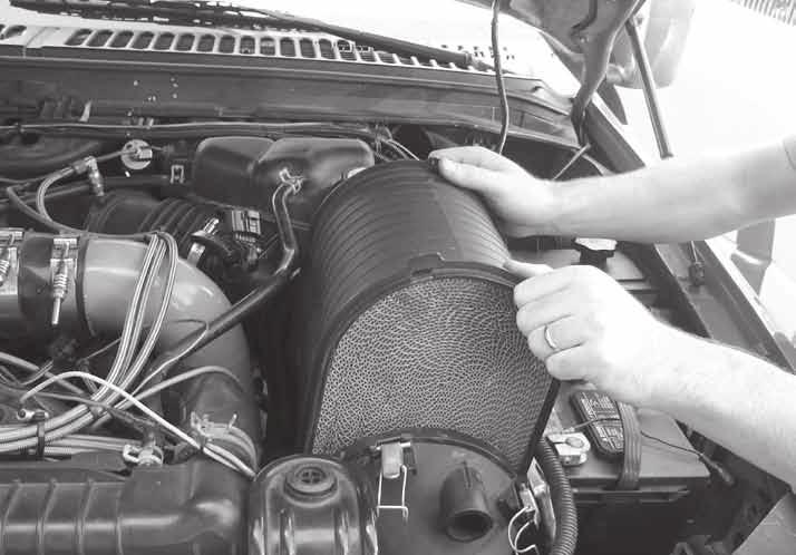 Figure 5 7. Remove the front air cover by withdrawing and lifting out of engine bay. 8. Remove the rear air cover.