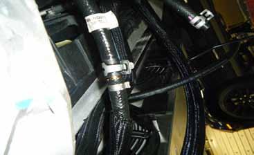 Connect the OEM power steering hoses, from the rack and P/S pump, to the brass barbs.