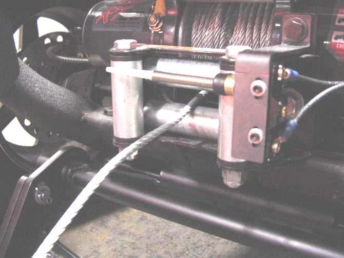 Spring Perch at Highest Setting 9.4 Tighten the limit switch bolts so that the limit switch is centered in the bracket slots, per fig. 9.4. 9.5 NOTE: Please refer to your winch owner s manual for proper winch operation.