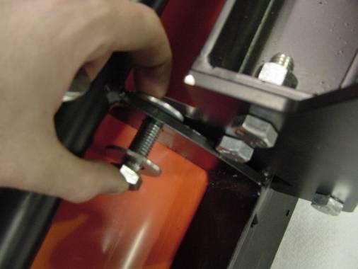 5, with a pair of pliers stretch the handle spring away from moldboard and engage the spring hook into the retaining slot of the upper A-frame plate. 5.