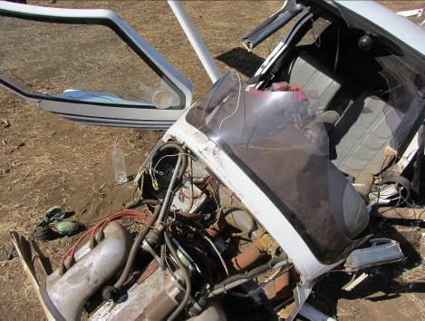 Figure 5 Broken window posts 1.12.3 The engine remained retained inside the engine mounting support and displayed heavy impact damage at the bottom of the engine. 1.12.4 The propeller was attached to the engine and both the propeller tips were separated from the propeller.