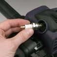 Install the spark plug finger tight in the cylinder head, then tighten it firmly with the spark plug wrench.
