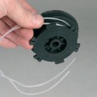 Remove the bump knob completely and remove the spool from the spool shaft. Discard any short lengths of remaining cutting line. 5. Take a 4 metre length of Ø2mm line and halve it. 6.