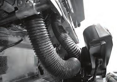 Place the evaporator unit onto the passenger side floorboard, and route the ECU wires (previously disconnected on Page 15) through