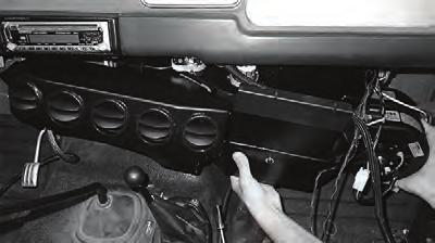 Insert the 1/4 x 1 ½ stud on the evaporator front passenger side bracket through the firewall, and secure it with a 1/4-20 nut (See