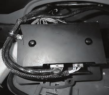 3. 4. ECU & ECU Bracket Installation (Cont.) Route the (2) wiring harnesses along the ECU bracket, and secure them using a #2 Adel clamp and a 10-24 x 1/2 screw (See Photo 96, below).