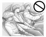 Seats and Restraint System 1-27 { CAUTION Never do this. Never allow two children to wear the same safety belt. The safety belt can not properly spread the impact forces.