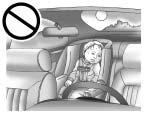 2-14 Features and Controls Windows { CAUTION Leaving children, helpless adults, or pets in a vehicle with the windows closed is dangerous.