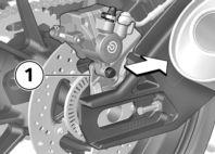 z Maintenance Roll rear wheel further into swing arm while simultaneously pushing brake caliper carrier 1 toward the front.