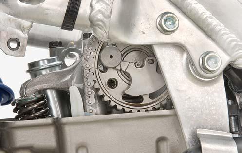 16. Make sure the punch mark on the primary drive gear is aligned with the index mark on the right crankcase cover. INDEX MARK 19.