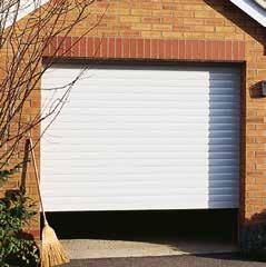 replacing a conventional door and frame. It also allows the door to fit garage openings of all shapes and sizes.
