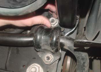 (two per side) then remove the stabilizer bar mounts and pull down on the stabilizer