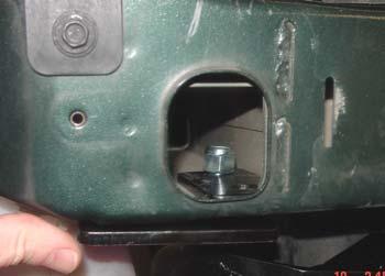 Bolt through the front mounting hole in the receiver brace, three-hole backing