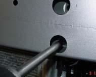 Locate the inner two holes on each side and drill 17/32"