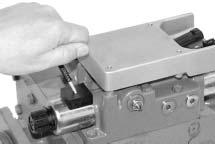 Installation H. Rotate the neutral adjustment screw to the position between the two marks. I. Carefully hold adjustment screw while torquing locknut. Torque locknut to 10±1 lbf ft.