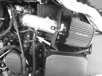intake fitting and attach the other end to the valve cover port as