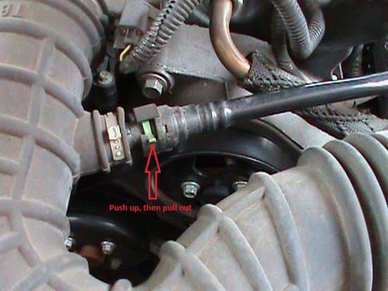 2. Next disconnect the other one near the throttle body (the PCV valve).