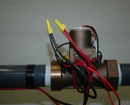 No flow indicates bad wiring. TESTING AT THE FLOW METER STEP 4 Reconnect the field wires to the Flow Meter using two (2) yellow wire nuts.
