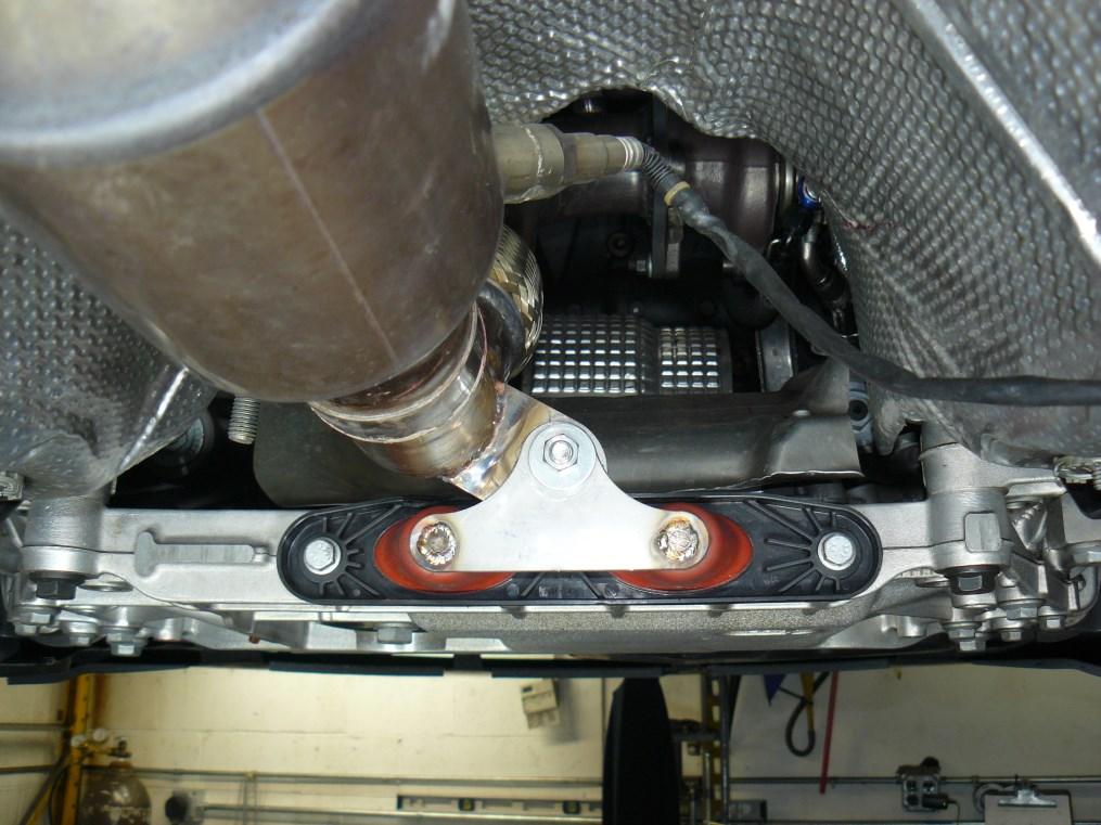Step 4 Once the whole downpipe assembly is installed in the vehicle, make all necessary alignment adjustments and then install the lower front bracket assembly,