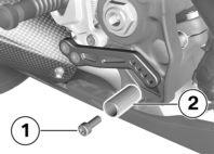 Adjusting shift lever Make sure ground is level and firm and park motorcycle. Remove bolt 1 while bracing nut 2.