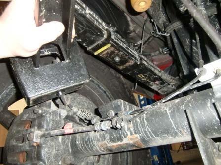 Remove the u-bolts and lower the axle plate.