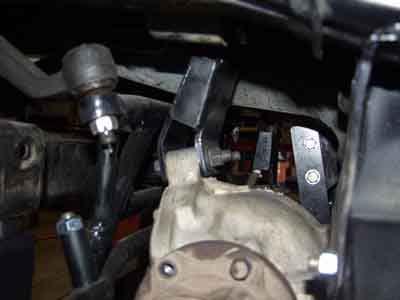 control arms 7 Remove CV axles, spindles, upper and lower control arms 8 Unbolt front drive line from front
