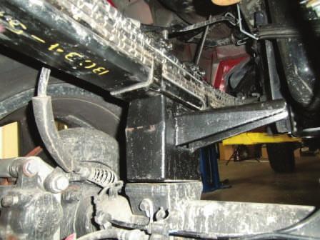 Place new lift block into original position and raise axle Center