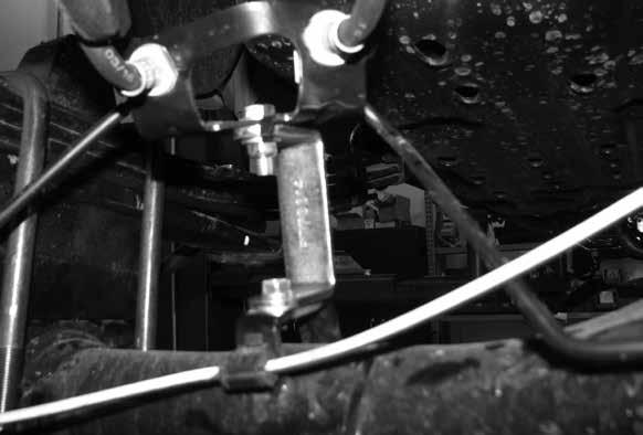 49. Locate FT70014 (brake line bracket rear axle). Attach to the factory perch using the factory hardware.