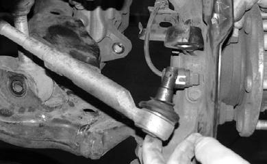 Save the bar and end links with all hardware. SEE FIGURE 3 2. Working from both sides of the truck, locate and remove the factory skid plate and the 2 support brackets.