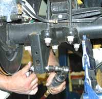 Install the new Skyjacker sway bar drop brackets to the frame using the OEM hardware.
