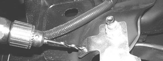 Using the supplied 3/18 x1 ¼ bolt, nut, and washer, bolt the front of the