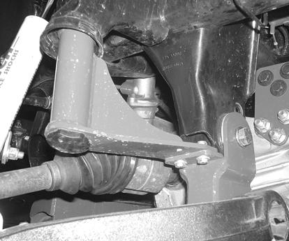 The large factory Torx bolt goes into the rear lower control arm pivot. Leave loose at this time. 31. Install the C.V.