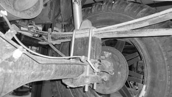 Attach the axle to leaf springs with new u-bolts and factory u-bolt plates.
