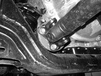 Remove the 2 bolts that attach the rear differential mount to the diff.