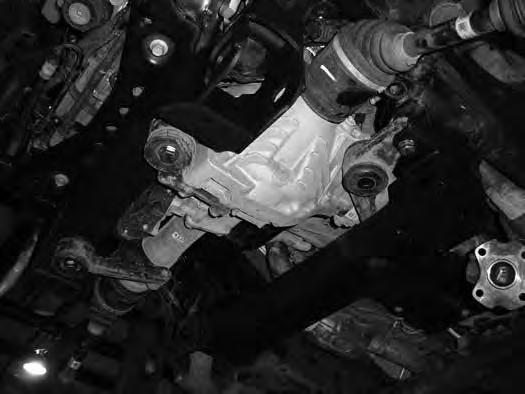 Figure 33 41. After all of the differential hardware is installed, push the differential rearward as far as possible and torque the two front differential mount bolts to 90 ft-lbs.