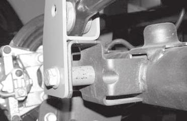 trac bar mount. Using the provided 3/8 hardware, attach the new bracket to the factory mount and torque to 30 lbs.