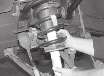 Torque the upper and lower bolts to 59 ft-lbs. SEE FIGURE 32 FIGURE 29 30.