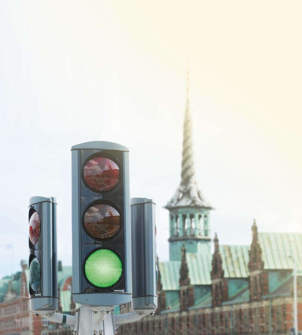 FOR A GREEN WORLD. At traffic lights too. On red, the world stands still, on green, it flows. This simple principle guides traffic at all traffic-light controlled road junctions around the globe.