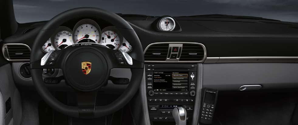 each Porsche model. In conjunction with PCM, the system supports digital 5.1 surround sound on audio and video DVDs to create a lifelike audio environment.