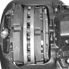 disc brake axle with WABCO calipers Work Sequences 1 Figures Slide the caliper 1 by hand towards the wheel side (arrow) and remove the brake pad 35.
