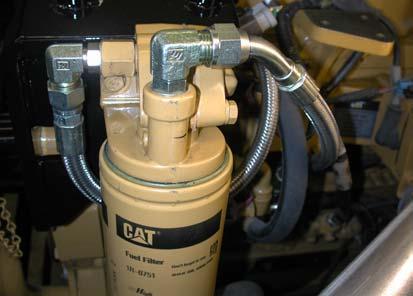 Cut Cylinder head fuel hose Rear of fuel pump hose Figure 15, hose connections on the fuel filter. Figure 16, Bracket cut details. 9.