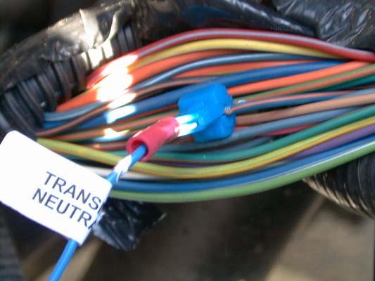 7. The recommended procedure for connecting the blue wire to the light blue wire with the orange tracer is by soldering