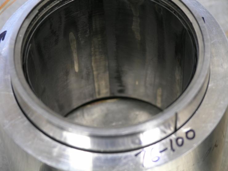 areas of fine surface polishing. Measurements with a micrometer confirmed the absence of any diametric changes in the PS304 coating. Figure 6.