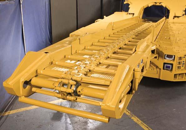 Gathering Head and Conveyor Gathering Head The CM235 offers a variety of 3-finger centrifugal loading arms (CLAs) to meet customer requirements as well as a choice of three chain and CLA