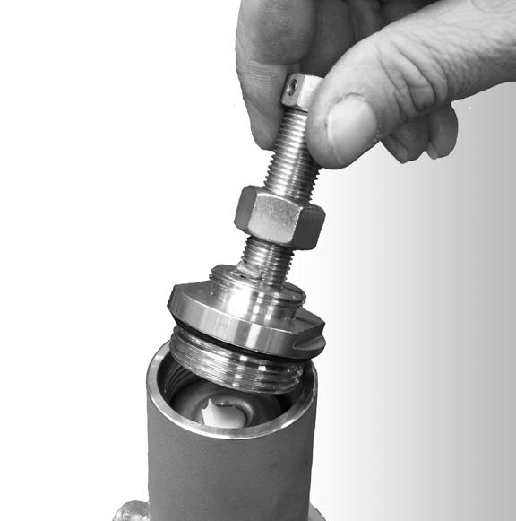To avoid galling of adjusting screw, apply a small amount of lubricant (such as NEVER SEEZ by Bostik) to the adjusting screw thread. Lubricate with Petroleum Oil Grease such as LUBRIPLATE No.