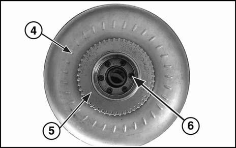 40. Mount Gear P.T.O Input (5) on the torque converter (4), assemble with 6 socket bolts (6). 41.