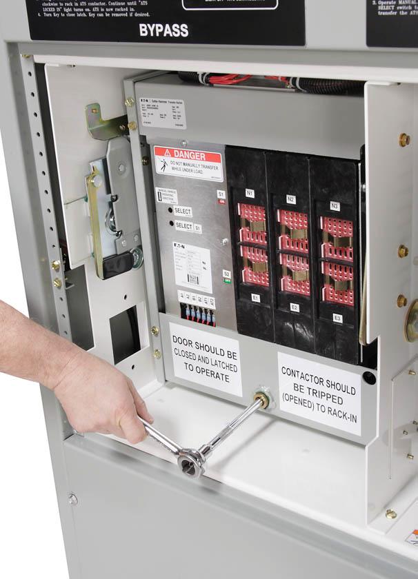 Instructional Booklet Page 12 Effective: March 2015 Up to 400 amps (600 Vac Max) ATC-300+/ATC-900 Contactor Open/Closed Figure 13. Unit with the Door Open (to Show Mechanism). 3.