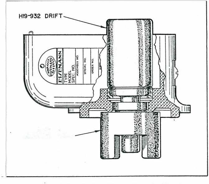 Section V Paragraphs 6-12, -13 Hl9 933 SUPPORT BLOCK the recess cut in the base plate (Tool No. H 19-938), and with bearing hole toward the solid end of base plate, use drift (Tool No.
