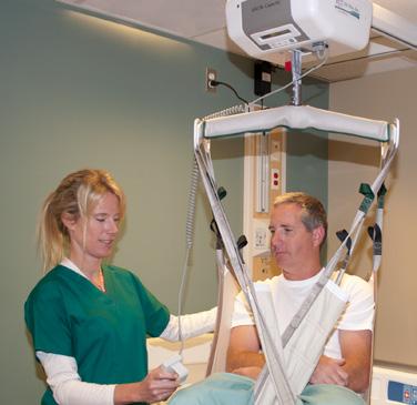 EZ CEILING LIFT A battery-operated patient lift that is mounted in tracks that are installed into the ceiling.